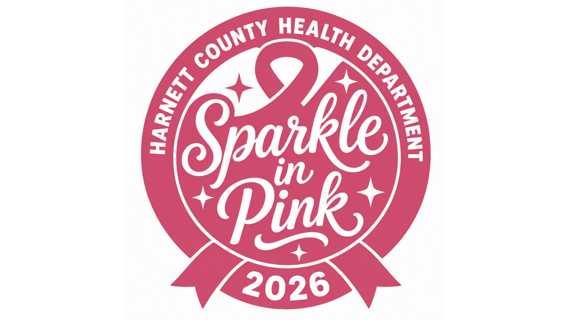 Pink circular health department badge with the words “Sparkle in Pink,” white stars, and a ribbon